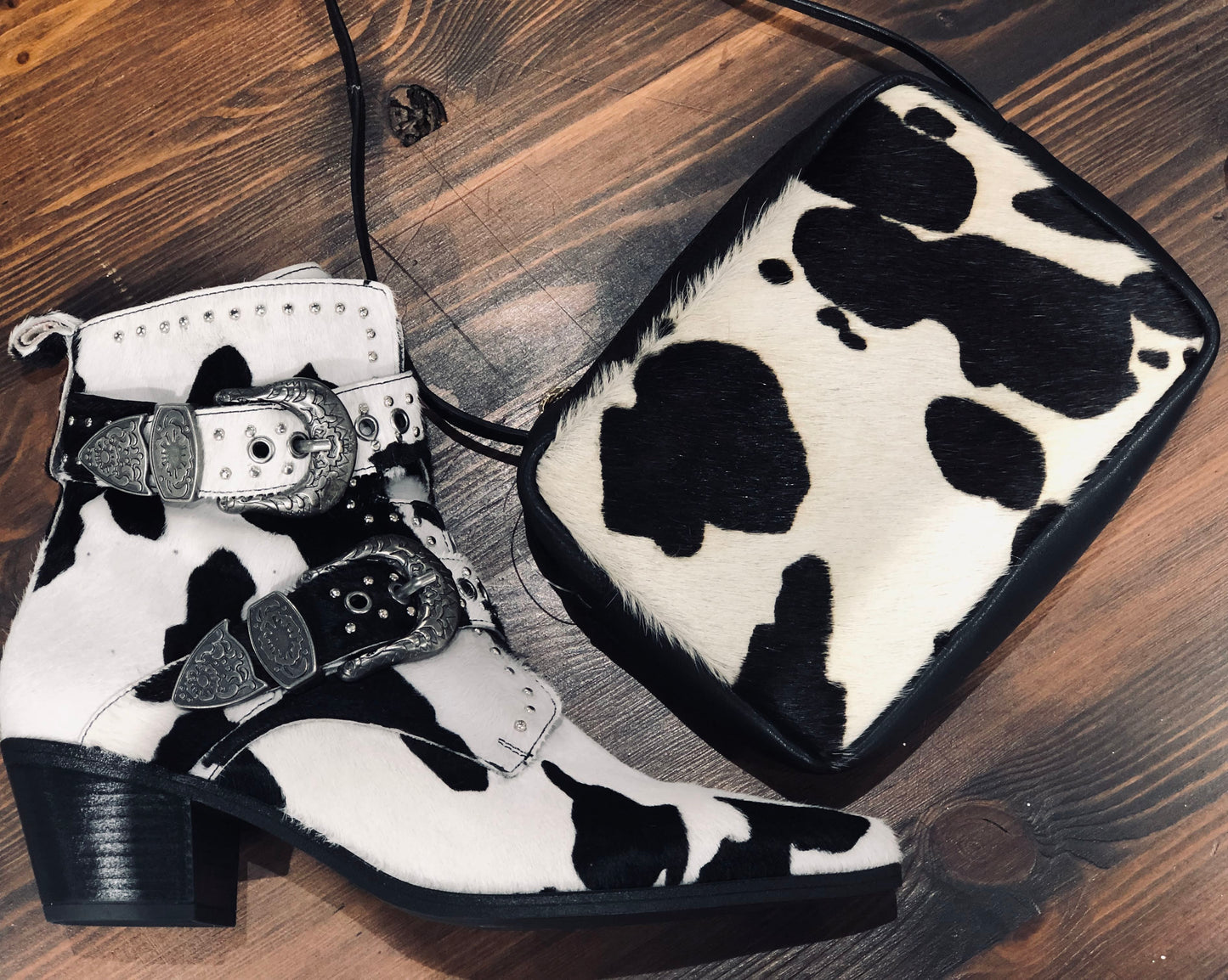 Cow print leather cuff, belt and bag