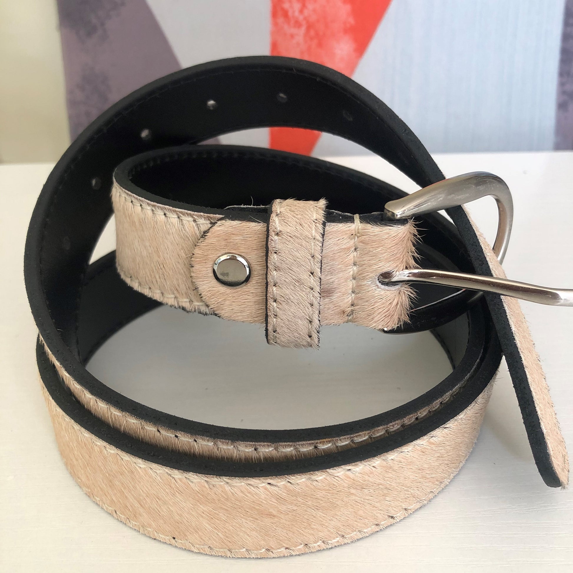 close image of hair on Beige Leather Belt.